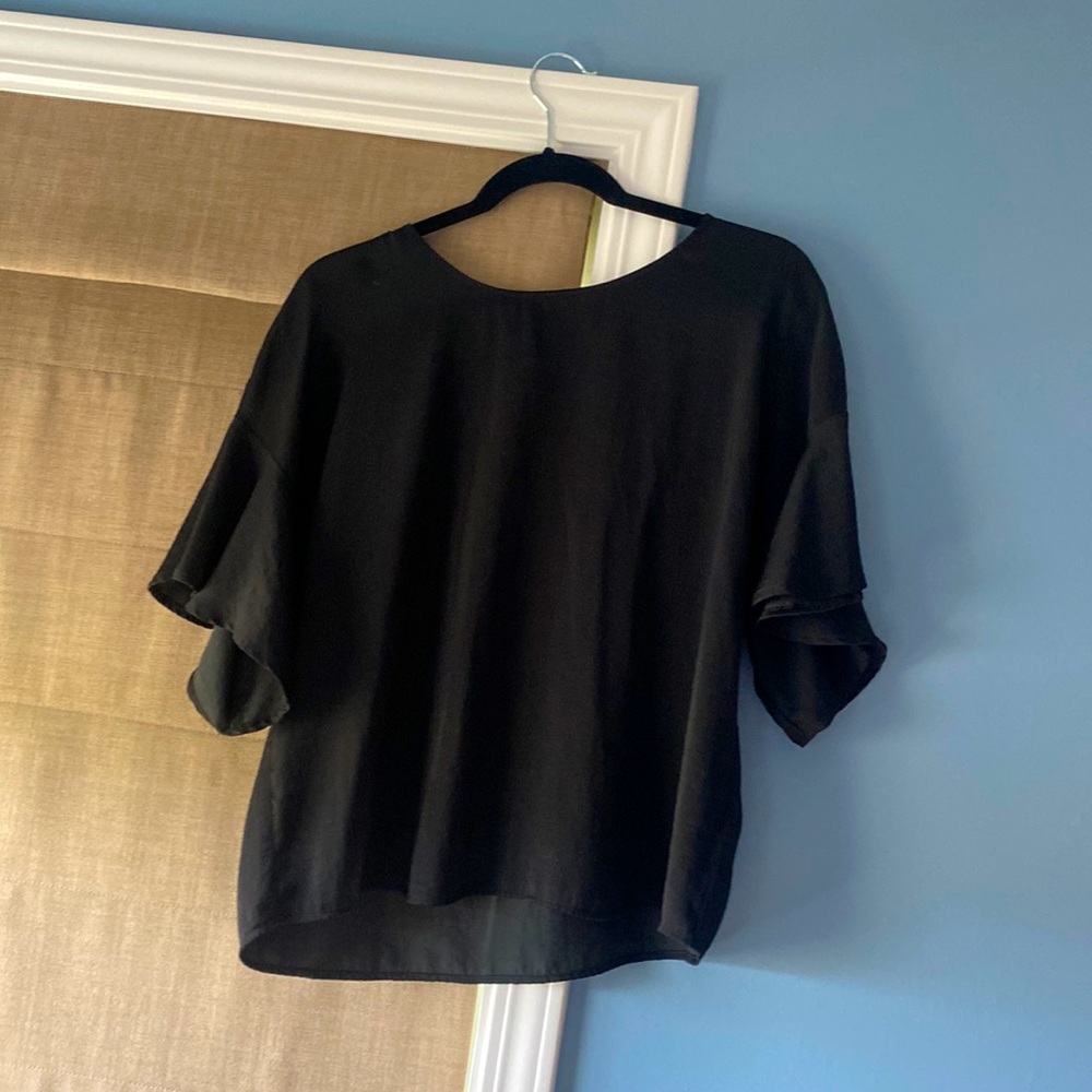 Black satin crepe quarter sleeve top.